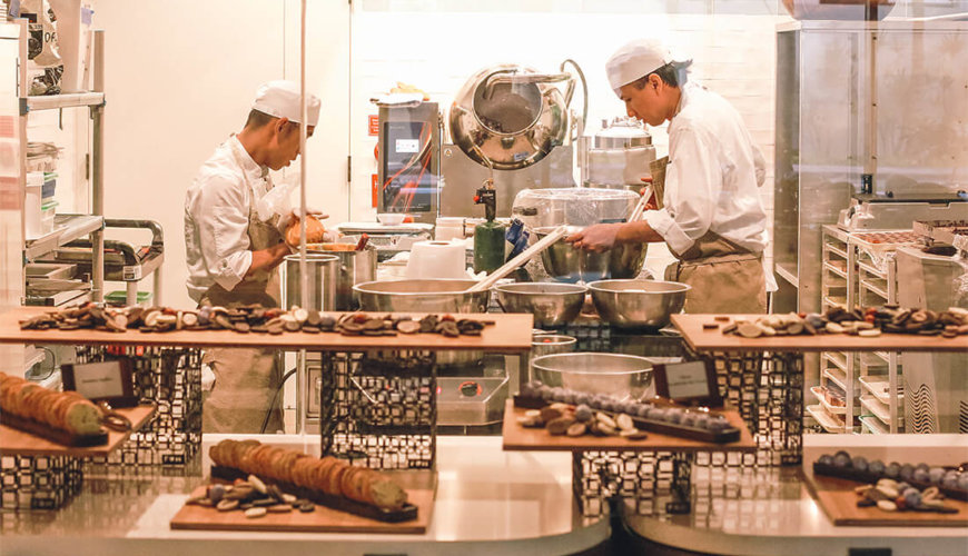 Bakery staff prepare a variety of artisan delicacies